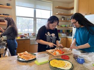 cooking together (Photo by Annie Ling)