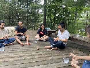 Armando's workshop: everyone learning to make a pinch pot