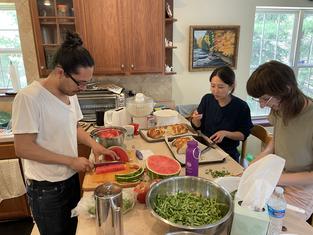 Armando, Junghyun, and Allie prepping lunch