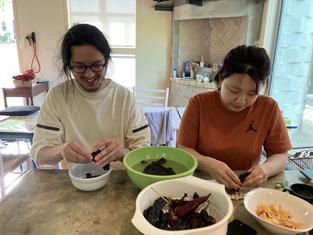 Lucas and Kyeongbin preparing the chiles for mole